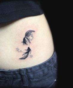 Pisces Fish and Constellation Hip Tattoo