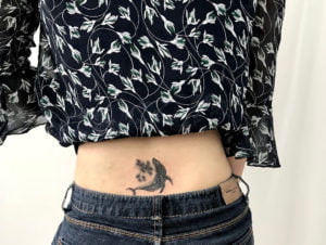 Sagittarius Constellation and Whale Lower Back Tattoo