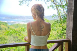 Sagittarius Bow and Moon Spine Tattoo