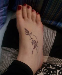 Sagittarius Arrow Black Ink Foot Tattoo