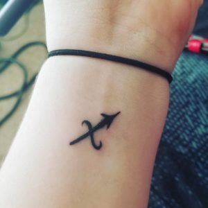 Mini Sagittarius Symbol Wrist Tattoo