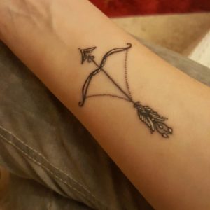 Zodiac Sagittarius Bow Black and White Wrist Tattoo