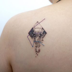 Aquarius Jar and Flowers Shoulder Blade Tattoo