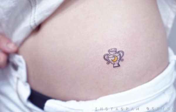 Aquarius Jug and Moon Hip Tattoo