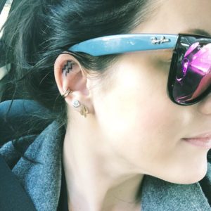 Aquarius Symbol Inner Ear Tattoo