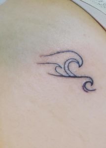 Aquarius Wave Thigh Tattoo