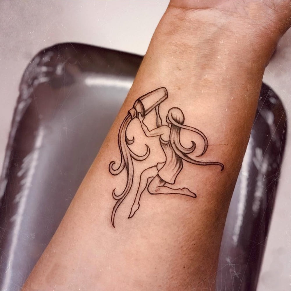 female water bearer tattoo