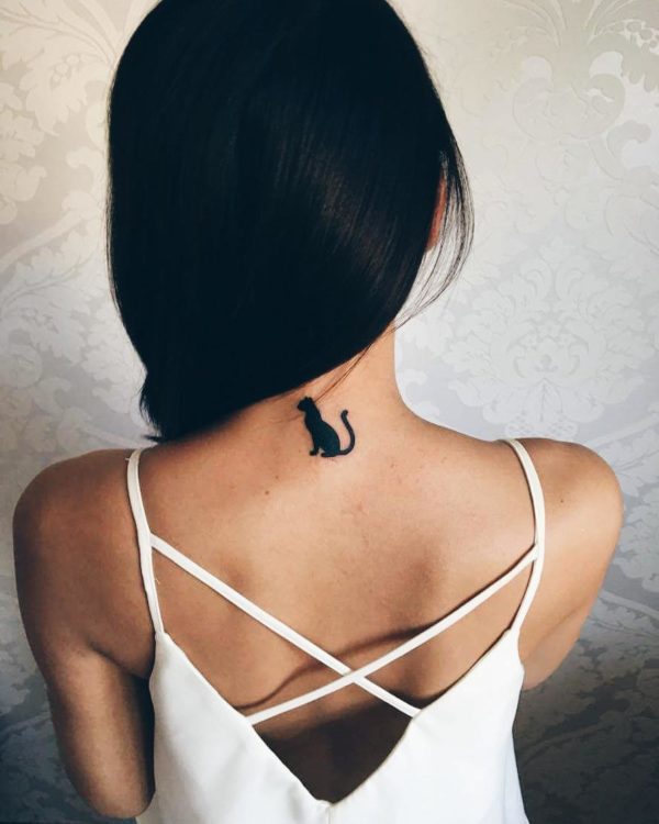 Peekaboo cute black cat tattoo evil eye  design with small black heart   and a small red heart  on neck done permanenttattooart  Instagram