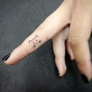 Cat Face Line Art Finger Tattoo