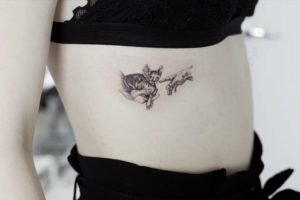 Illustrative Cat Hand of God Side Tattoo