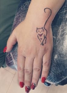 Cat Outline Back of Hand Tattoo