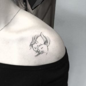 Snuggle with Cat Collarbone Tattoo