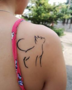 Abstract Cat Outline Shoulder Blade Tattoo