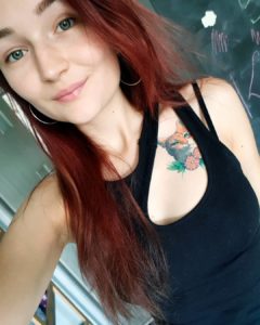 Realistic Orange Cat Collarbone Tattoo