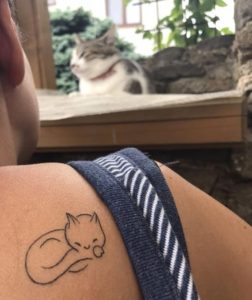 Sleeping Cat Shoulder Blade Tattoo