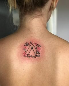 Gemini Symbol and Vine Upper Back Tattoo
