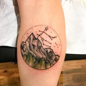 Gemini Constellation and Mountains Forearm Tattoo