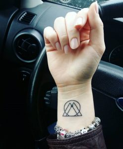 Mini Zodiac Gemini Symbol Line Art Wrist Tattoo