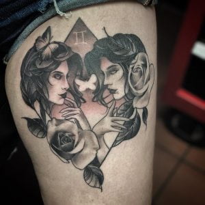 Gemini Faces Portrait Thigh Tattoo