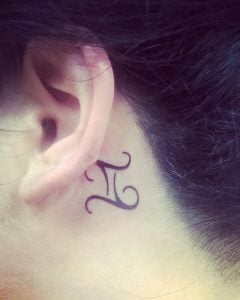 Mini Gemini Symbol Behind the Ear Tattoo