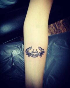 Cancer Crab and Symbol Forearm Tattoo