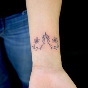 Aries Floral Symbol Wrist Tattoo