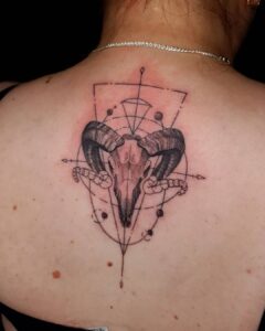 Aries Skull Geometric Upper Back Tattoo