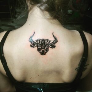 Stylized Taurus Bull Upper Back Tattoo