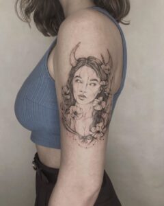 Taurus Girl with Horns Illustrative Arm Tattoo
