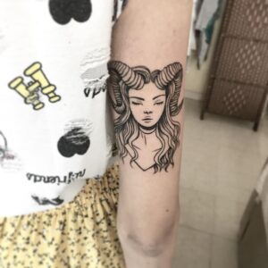 Taurus Girl with Horns Arm Tattoo