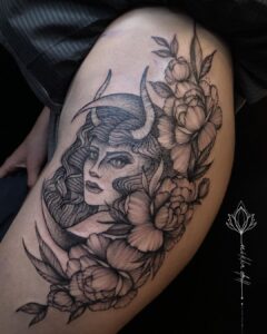 Female Taurus Floral Thigh Tattoo