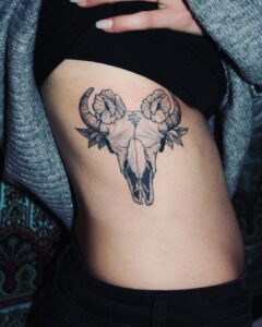 Taurus Skull and Flowers Side Tattoo