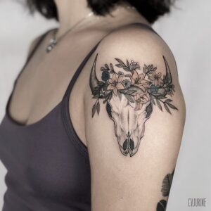 Taurus Skull and Floral Shoulder Tattoo