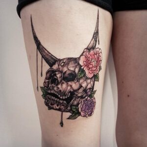 Taurus Skull Horns and Flowers Thigh Tattoo