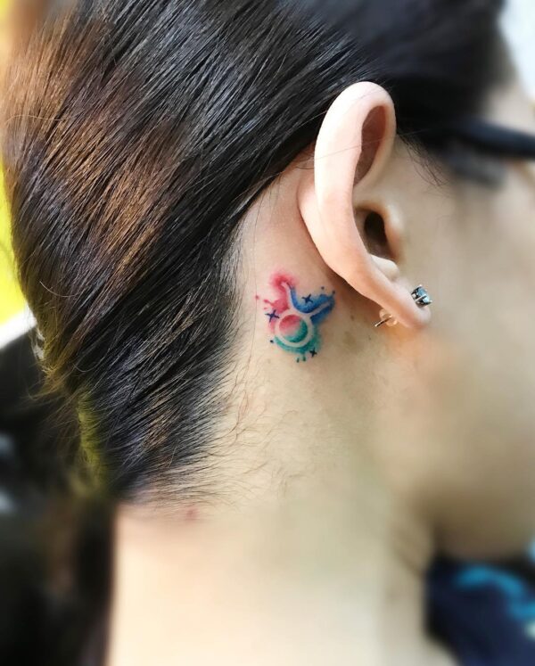 Zodiac Taurus Symbol Watercolor Behind the Ear Tattoo