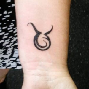 Taurus Tribal Symbol Wrist Tattoo