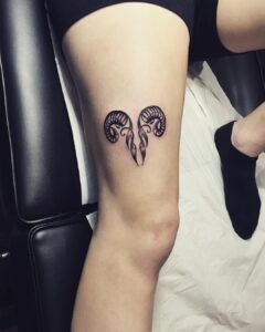 Aries Abstract Horns Thigh Tattoo