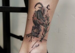 Aries Watercolor Ram Ankle Tattoo