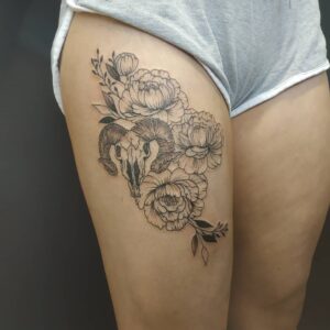 Aries Skull and Flowers Thigh Tattoo