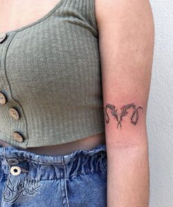 Aries Symbol in Vine and Flowers Arm Tattoo