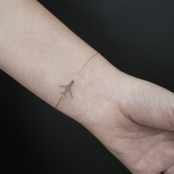 Travel Airplane Wrist Tattoo