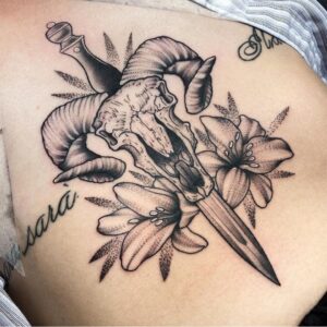Aries Skull with Dagger Side of Body Tattoo