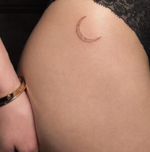 Crescent Moon Hip Tattoo