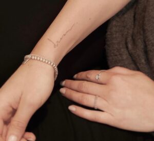 Dreams Script Wrist Tattoo