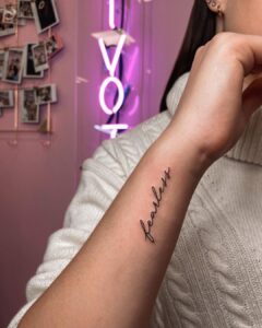 Fearless Script Wrist Tattoo