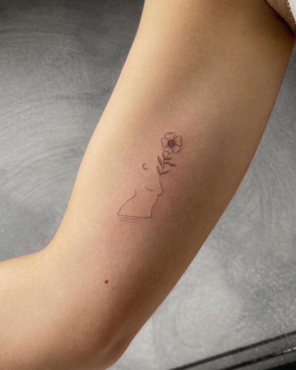 Flower And Body Upper Arm Tattoo
