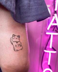 Maneki Neko Back of Arm Tattoo