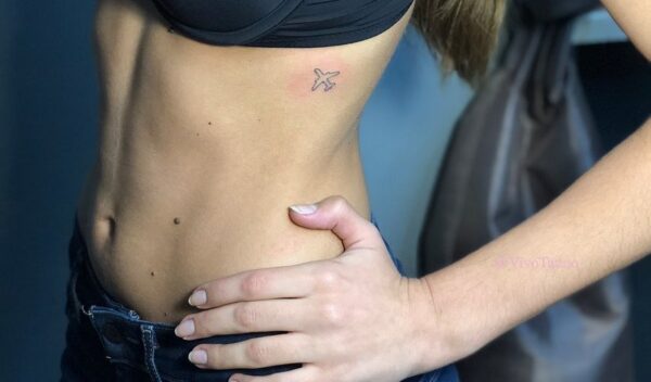 Flying Airplane Side Tattoo