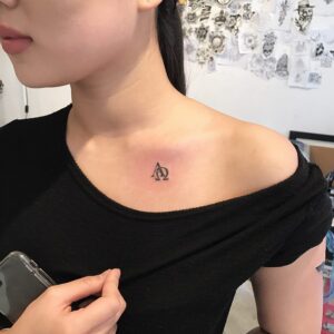 Mini Alpha Omega Chest Tattoo