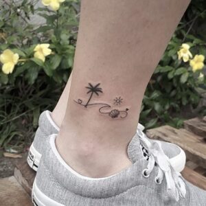 Beach Themed Ankle Tattoo